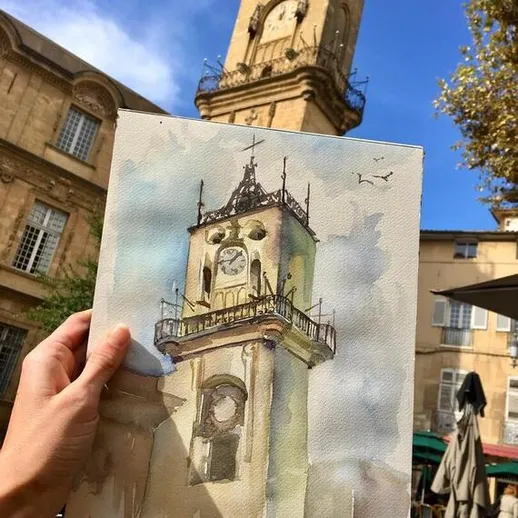 Акварельный рисунок башни мэрии на фоне ясного неба в городе