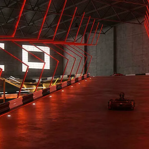 Автогонка в современном здании с эффектным освещением и оригинальным дизайном