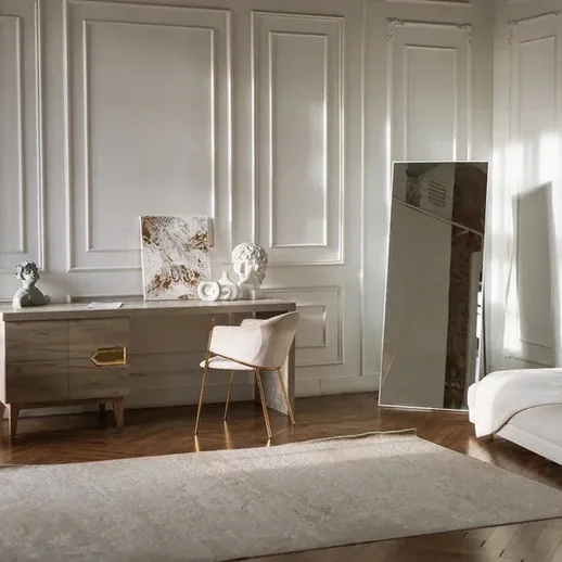 Современный интерьер стильной гостиной с мягким освещением и элегантной мебелью