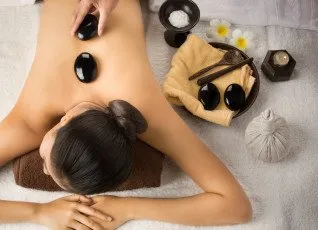 Массаж горячими камнями