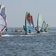 Windsurfing на озере в солнечный день, спортсмены показали отличные навыки и маневры на воде - превью 7