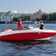 На воде моторная лодка с капитаном и пассажиром в Санкт-Петербурге - превью 12