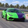 Спортивный автомобиль Lamborghini Huracán на треке в Кинорусе, демонстрирующий высокую скорость и маневренность - превью 1