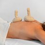Массаж лица с использованием специального инструмента в косметическом салоне - превью 1