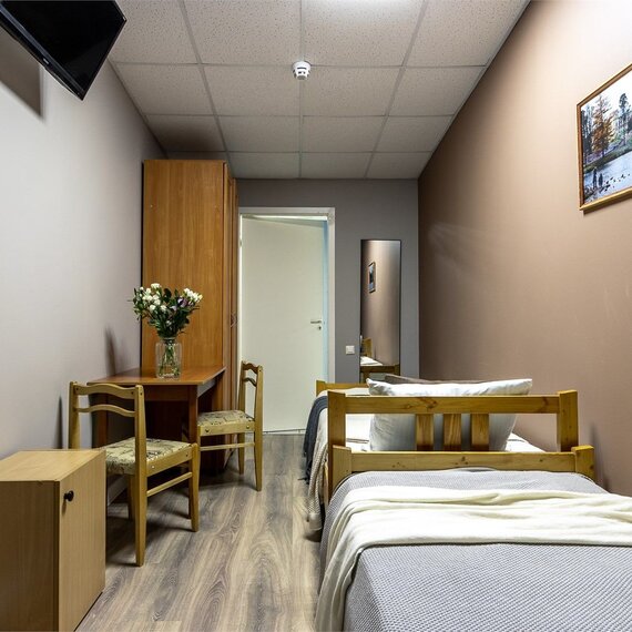 Стандартный номер с общей ванной комнатой. Фото 1