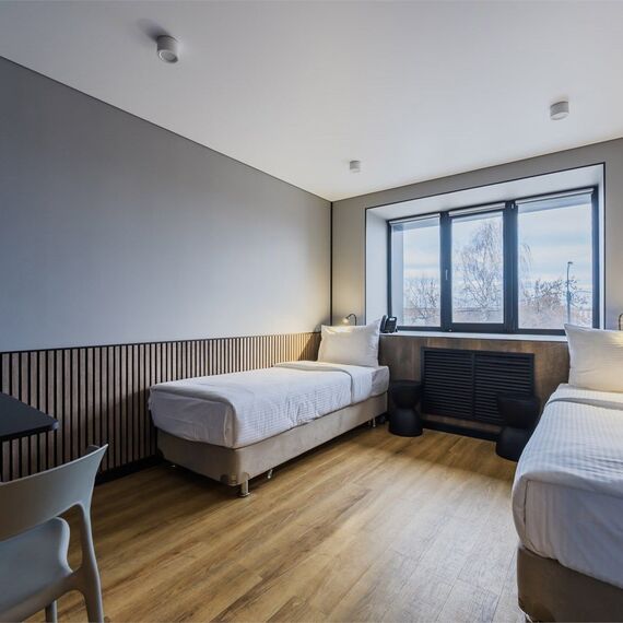 Стандарт с 2 односпальными кроватями. Фото 4