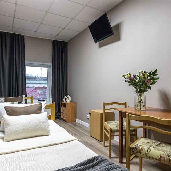 Стандартный номер с общей ванной комнатой. Фото 7