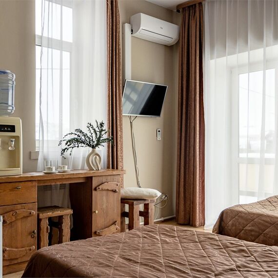 Улучшенный номер с 2 раздельными кроватями. Фото 9