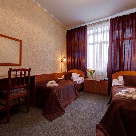 Двухместный номер Эконом с раздельными односпальными кроватями. Фото 3