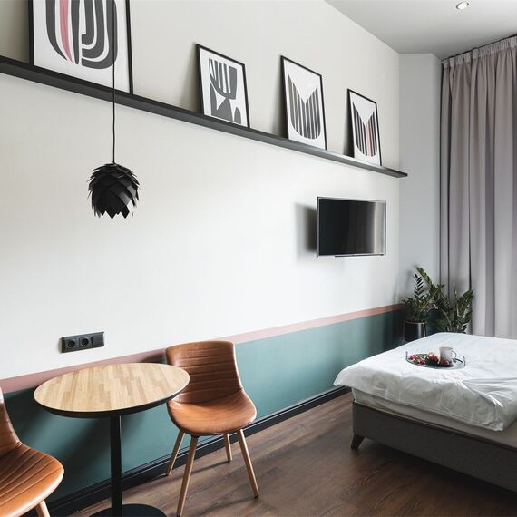 Стандартный номер-студио с видом на город. Фото 4