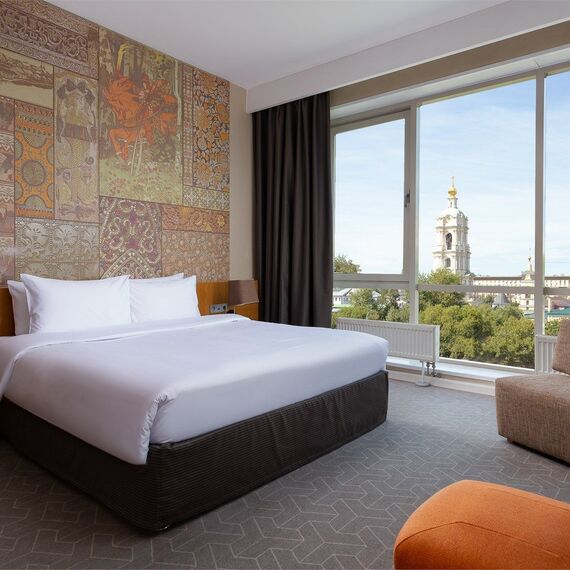 Стандартный номер с кроватью размера 