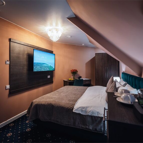 Номер на мансарде с окнами во двор. Фото 6