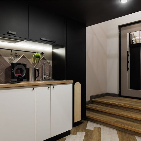 Двухуровневый номер-студио с видом во двор. Фото 5