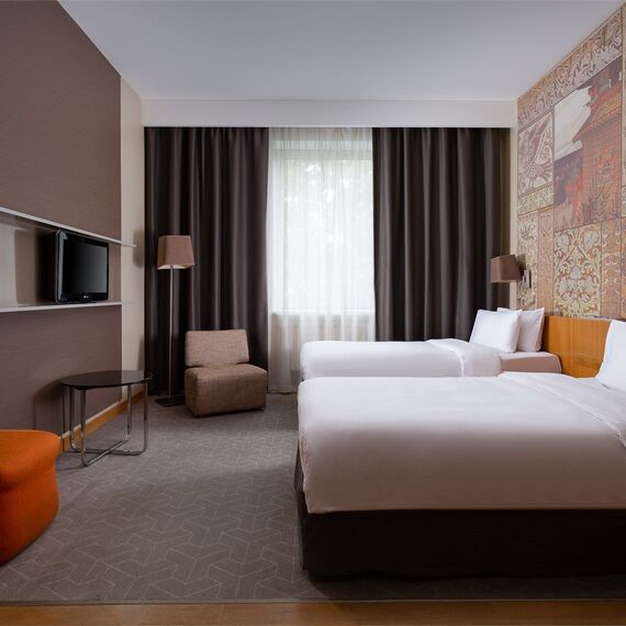 Стандартный номер с 2 отдельными кроватями. Фото 1