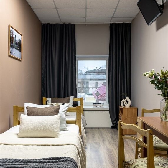 Стандартный номер с общей ванной комнатой. Фото 3