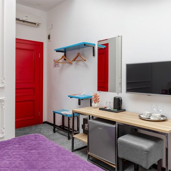 Номер с мансардным окном SKY LOFT. Фото 7