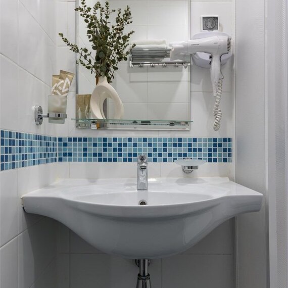 Улучшенный номер с 1 кроватью. Фото 20