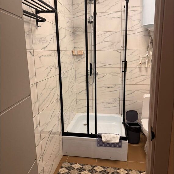 Улучшенный номер с 1 кроватью. Фото 2