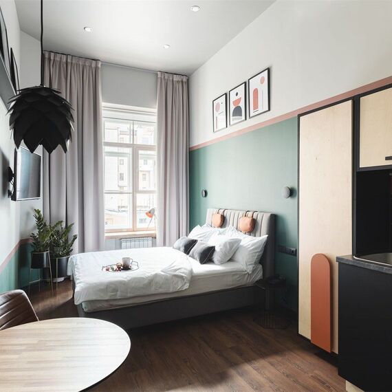 Стандартный номер-студио с видом на город. Фото 2