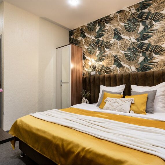 Улучшенный номер с 1 кроватью. Фото 1