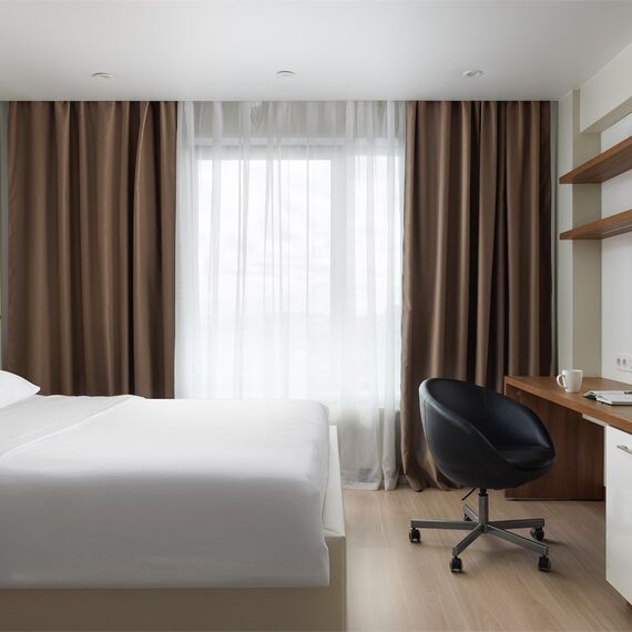 Стандартные апартаменты с одной большой кроватью (Митино). Фото 1