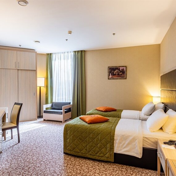 Улучшенный «Атриум» с раздельными кроватями. Фото 1