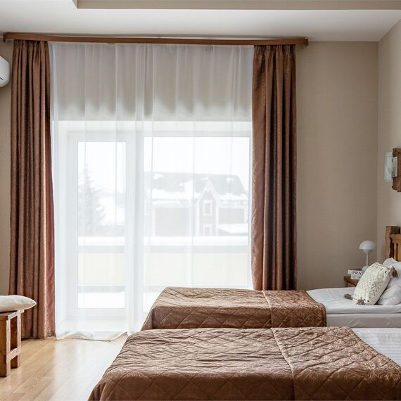 Улучшенный номер с 2 раздельными кроватями. Фото 11