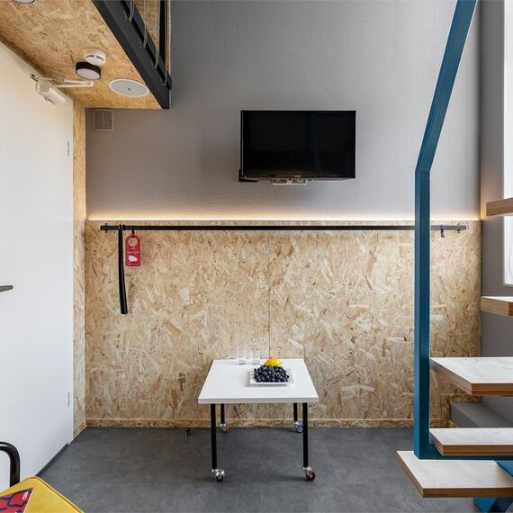 Дизайнерские двухуровневые апартаменты