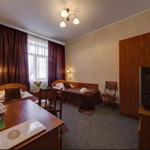 Двухместный номер Эконом с раздельными односпальными кроватями. Фото 4